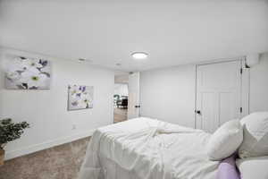 View of carpeted bedroom