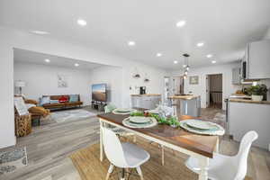 Dining room featuring light wood-type flooring