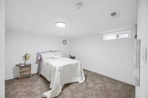 Bedroom featuring carpet floors