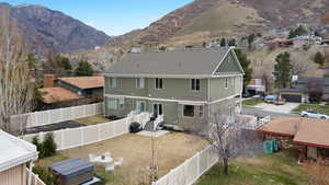 Back of property featuring a mountain view