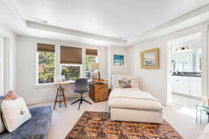 Carpeted bedroom with ensuite bath