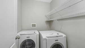 Laundry room featuring washer and dryer