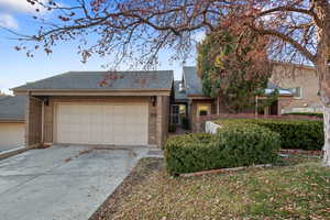 Ranch-style home featuring a garage