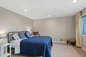 Bedroom featuring carpet