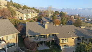 Birds eye view of property with a mountain view