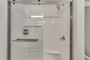 Bathroom featuring walk in shower