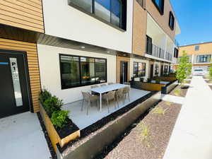 View of patio with outdoor dining space