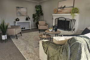 Living room featuring crown molding, carpet, and a brick fireplace