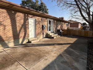 Rear view of house with a patio area