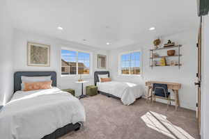 Bedroom featuring carpet flooring