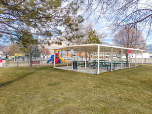 Dock area with a playground and a yard