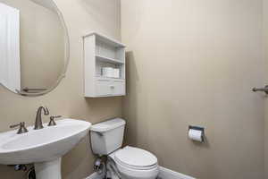 Bathroom with toilet and sink