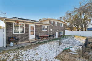 View of snow covered property