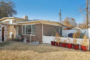 Front of house- siding to be finished on enclosed carport with right offer