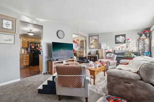 Living room with wood-type flooring