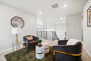 Sitting room with carpet floors