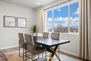 Dining space featuring hardwood / wood-style floors and a wealth of natural light