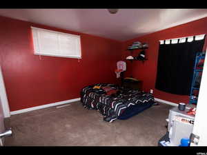 Bedroom featuring carpet