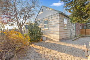 View of property exterior with a patio area