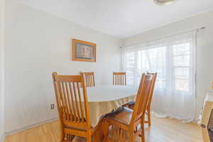 Dining room featuring light wood-type flooring