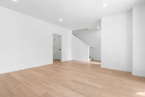 Unfurnished room featuring light wood-type flooring