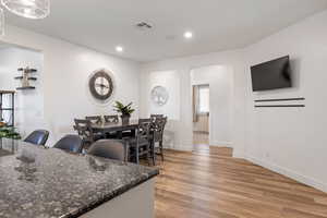 Dining area featuring light wood-type flooring