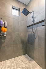 Bathroom with tiled shower