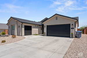 Ranch-style home with a garage