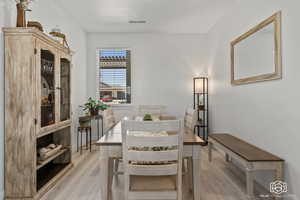 Dining room with light wood-type flooring