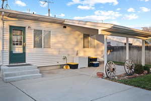 Rear view of house with a patio