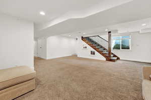 Unfurnished living room with carpet flooring