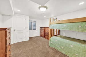 View of carpeted bedroom