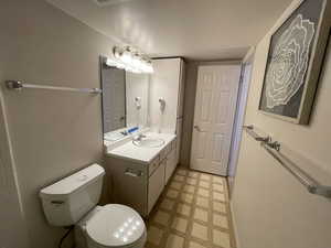 Bathroom with vanity and toilet