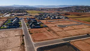 Birds eye view of property with a mountain view