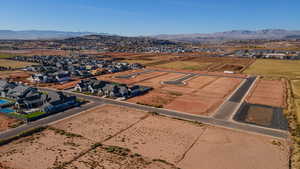 Birds eye view of property with a mountain view