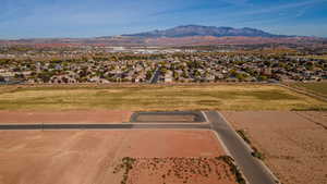 Birds eye view of property featuring a mountain view