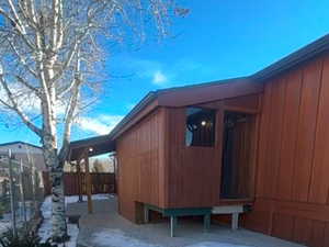 View of snow covered property