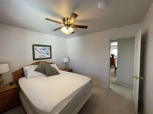 Bedroom featuring carpet flooring and ceiling fan