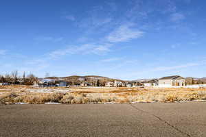 View of yard with a mountain view