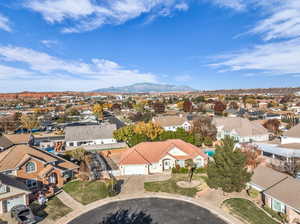 Birds eye view of property with a mountain view