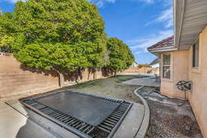 View of yard with a patio area