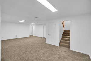 Basement with carpet floors