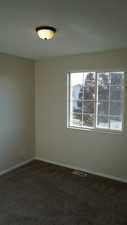 View of carpeted empty room