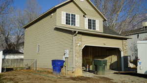 View of home's exterior featuring a garage