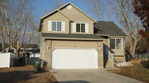 View of front of house with a garage