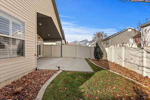 View of yard with a patio area and a mountain view