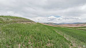 Property view of mountains featuring a rural view