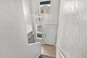 Foyer featuring floors