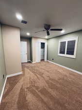 bedroom featuring carpet and ceiling fan