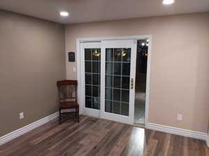 Doorway to closed in sun porch with fireplace